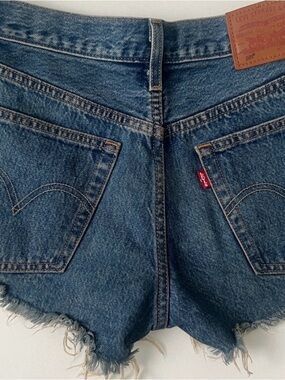 Levi's Medium Blue Denim Frayed Hem Cutoff Shorts